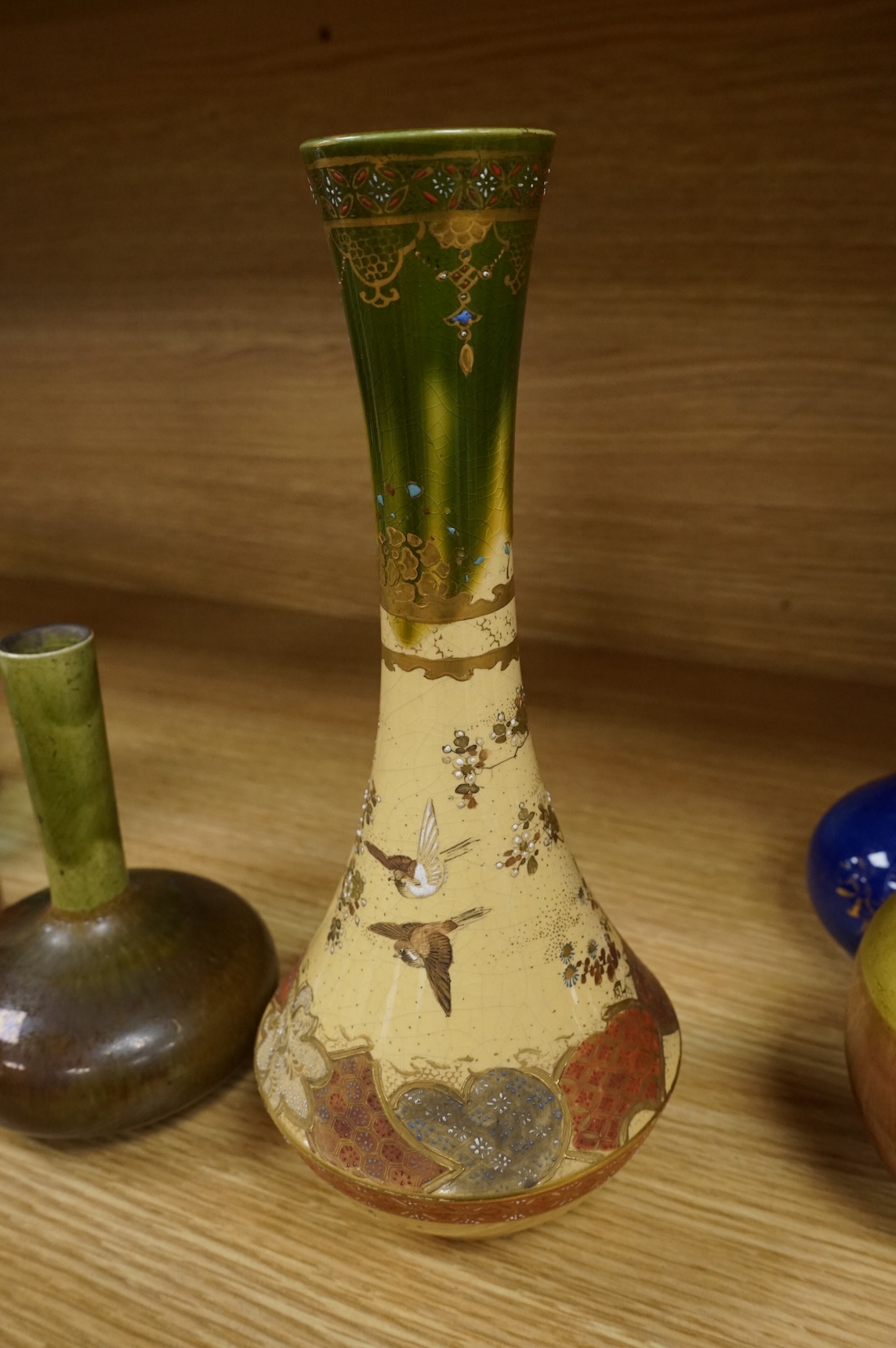 Three Japanese bottle neck vases and a Satsuma example, signed to the base, largest 25cm high
